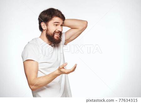 energetic man with beard on white background gesturing with hands cropped view 77634315