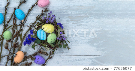 Willow twigs. Holy Easter. Easter eggs in the nest. Willow twigs. Holy Easter. Easter eggs in the nest. 77636077