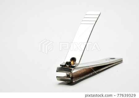 Nail clippers on white background Nail clippers on white background 77639329