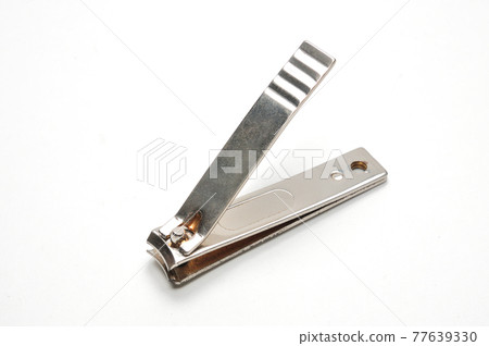 Nail clippers on white background Nail clippers on white background 77639330