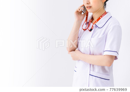 A nurse who is contacted for an emergency A nurse who is contacted for an emergency 77639969
