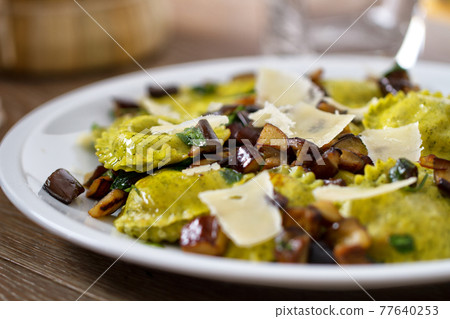 Ravioli with Chopped Eggplant and Parmesan Cheese 77640253