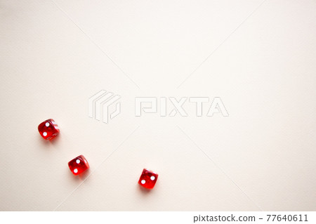 three dices red color on light background three dices red color on light background 77640611