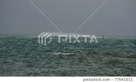 Okinawa sea with waves 77641011