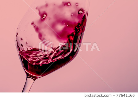 Red wine in crystal glass, alcohol drink and luxury aperitif, oenology and viticulture product Red wine in crystal glass, alcohol drink and luxury aperitif, oenology and viticulture product 77641166