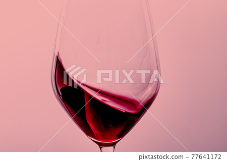 Red wine in crystal glass, alcohol drink and luxury aperitif, oenology and viticulture product 77641172