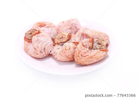 Dried persimmon, dried fruit, sweetness, bright background Dried persimmon, dried fruit, sweetness, bright background 77643366