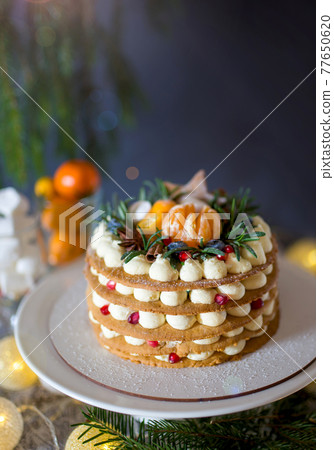 2021 is the year of the bull. Christmas or New Year decorated cake with cream cheese 77650620