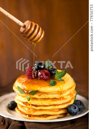 Stack of pancakes with fresh berries, close-up. Stack of pancakes with fresh berries, close-up. 77650755