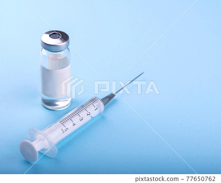 syringe on the table, medical supplies are on the table syringe on the table, medical supplies are on the table 77650762
