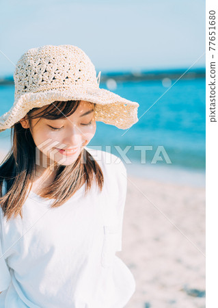Sea and young woman Sea and young woman 77651680