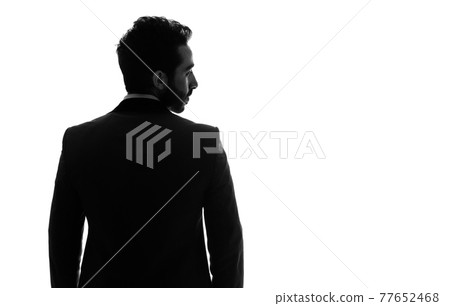 Back view silhouette of a foreign businessman Back view silhouette of a foreign businessman 77652468