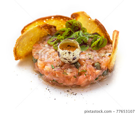 plate of salmon tartare 77653107