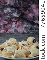 Butter cookies with sugar powder in a white ceramic plate 77659041