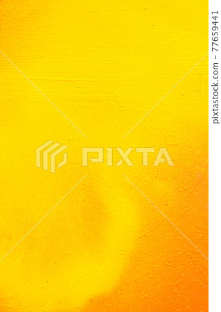 Abstract metal texture by spray can of paint. Gradient in orange, yellow. Vertical. Abstract metal texture by spray can of paint. Gradient in orange, yellow. Vertical. 77659441