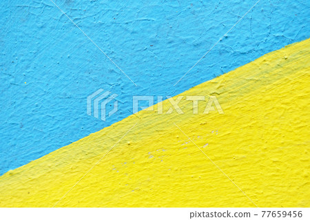 Abstract stucco texture in light shades of yellow and blue. 77659456