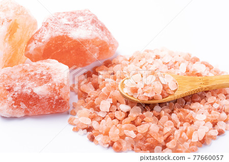 Pink salt Himalayan rock salt white background Pink salt Himalayan rock salt white background 77660057