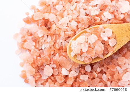 Pink salt Himalayan rock salt white background Pink salt Himalayan rock salt white background 77660058