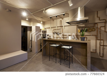 Room with island kitchen 77660324
