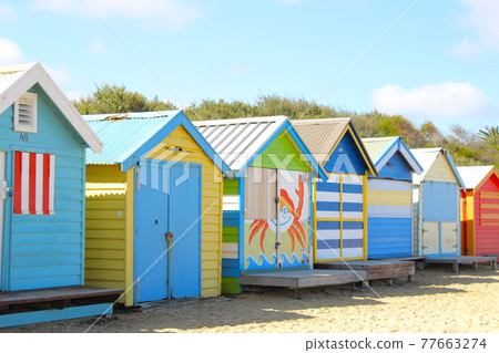 Blue sky and brighton beach hut 77663274