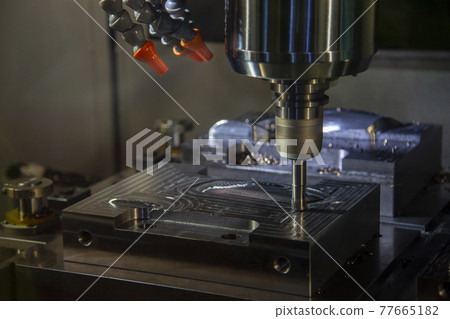 The CNC milling machine rough cutting . 77665182