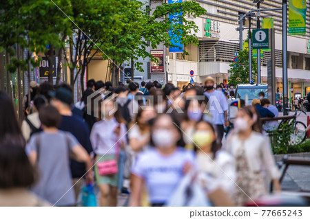 Expanded declarations for 9 prefectures of Tokyo cityscape in Japan. Threat crowd (back is toward Shinjuku station east exit) = May 15 Expanded declarations for 9 prefectures of Tokyo cityscape in Japan. Threat crowd (back is toward Shinjuku station east exit) = May 15 77665243