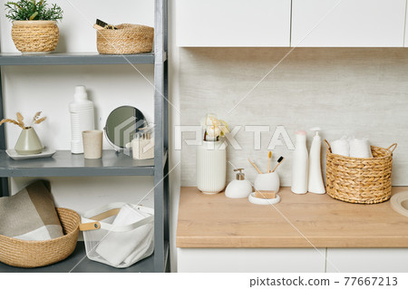A shelf with a variety of home and bodycare items 77667213