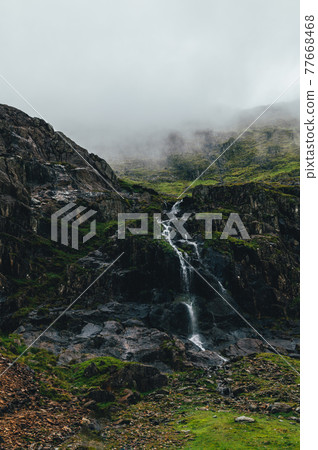 Beautiful landscape panorama of Snowdonia National Park in North Wales, UK Beautiful landscape panorama of Snowdonia National Park in North Wales, UK 77668468
