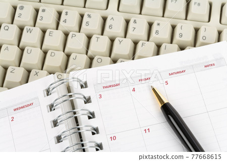 calendar and computer keyboard 77668615