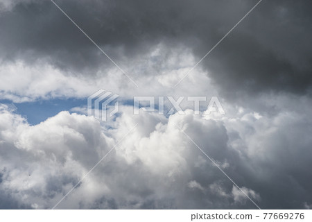 closeup of grey stormy sky background 77669276