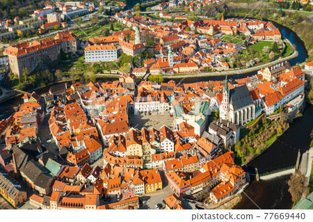 Top view of Old Town Cesky Krumlov and river Vltava, Czech Republic Top view of Old Town Cesky Krumlov and river Vltava, Czech Republic 77669440