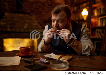 Man drooling a cigarette, tobacco smoking culture 77669652