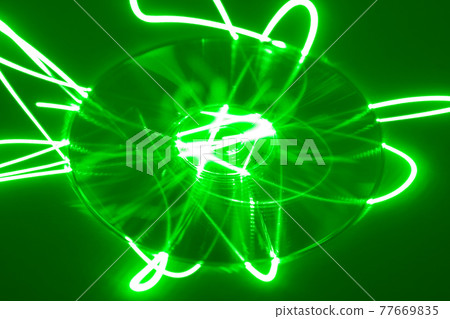 CD under green laser beam 77669835