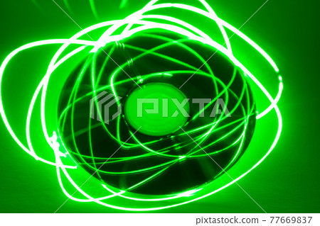 CD under green laser beam CD under green laser beam 77669837