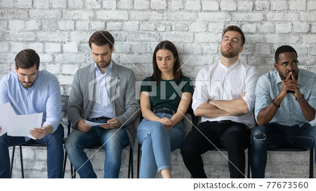 Tired job candidates waiting for interview far too long Tired job candidates waiting for interview far too long 77673560