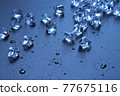 Ice and water drops 77675116