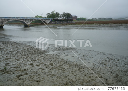 Incheon Metropolitan City. Sorae Wetland Park. Coastal area. Windmill. Walking trail 77677433