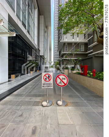 No dog allowed and no parking sign in residential area No dog allowed and no parking sign in residential area 77679178