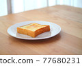 Toasted toast on the windowsill 77680231