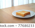 Toasted toast on the windowsill 77680233