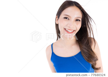 Portrait of asian mmiling woman isolated on white background. Close-up of young Asian beautiful woman with copy space. Portrait of asian mmiling woman isolated on white background. Close-up of young Asian beautiful woman with copy space. 77680324