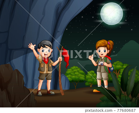 the scout boy and girl hiking in the cave the scout boy and girl hiking in the cave 77680687
