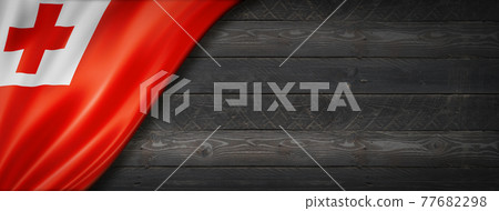 Tonga flag on black wood wall banner 77682298