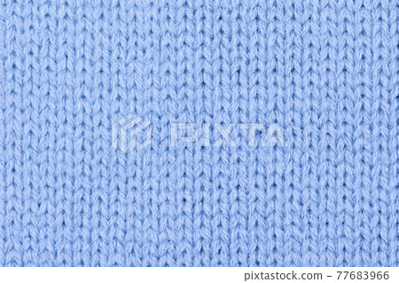 Blue wool knitted background. Blue wool knitted background. 77683966