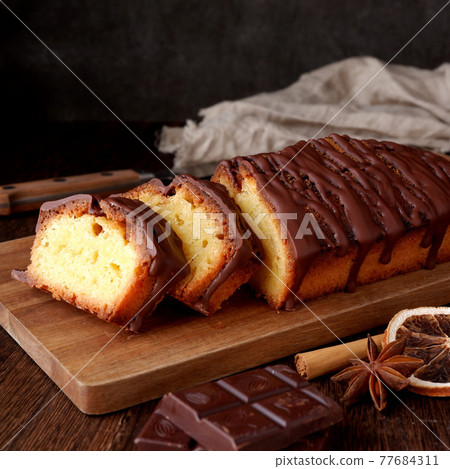 Chocolate coated orange cinnamon pound cake 77684311