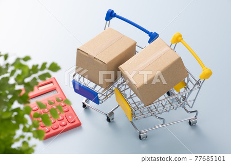Shopping cart and cardboard box Shopping image Shopping cart and cardboard box Shopping image 77685101