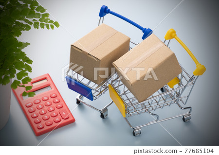 Shopping cart and cardboard box Shopping image 77685104