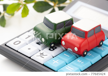 Car toys and calculator image photo Car toys and calculator image photo 77685424