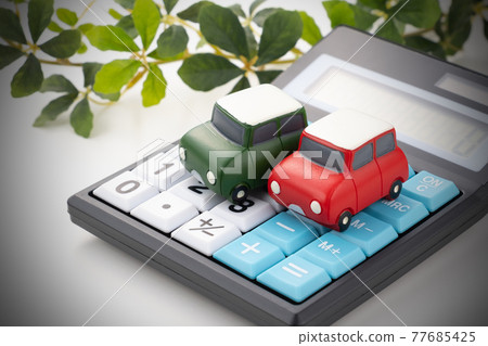 Car toys and calculator image photo Car toys and calculator image photo 77685425