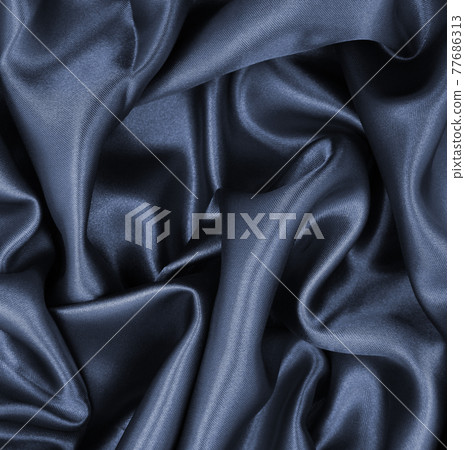 Smooth elegant dark grey silk or satin texture as abstract background. Luxurious background design Smooth elegant dark grey silk or satin texture as abstract background. Luxurious background design 77686313